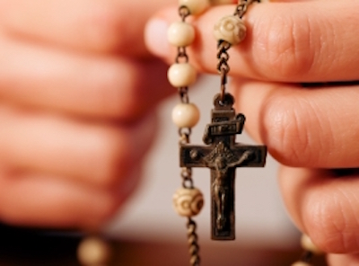 rosary hands istock montage